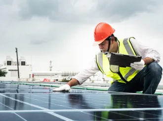 Technician checksphotovoltaic solar plant